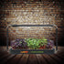 LaNiteX Hydro Garden with plants against a brick wall