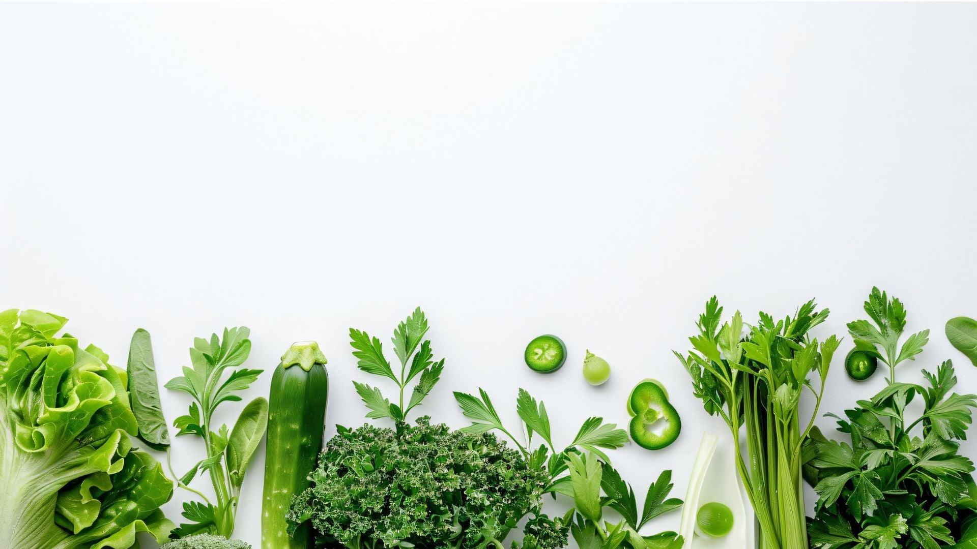 A rich collection of vegetables in various shades of green, red, yellow, and orange, full of natural freshness.